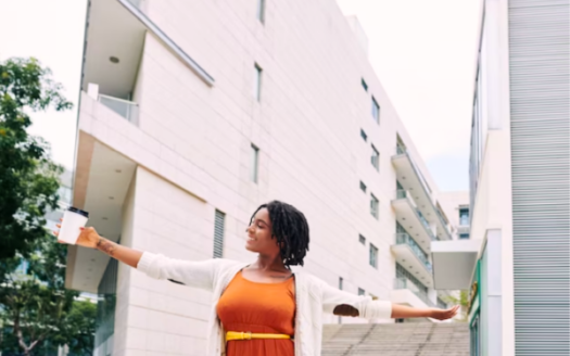 Image Of A Joyful African Woman In An Urban Setting